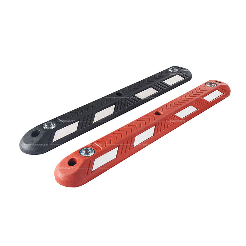 Lane separators made of black or red vulcanized rubber with white reflective tapes and glass road studs for road safety management