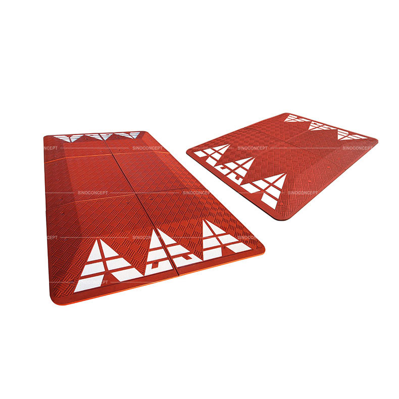 Rubber Europe speed cushions also called road cushions made of red vulcanized rubber and pasted with white reflective tapes