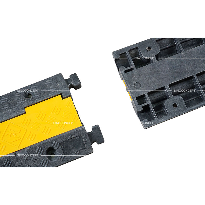 A two-channel outdoor cable protector made of plastic-rubber composite and plastic lid designed with a strong and convenient interlocking system.