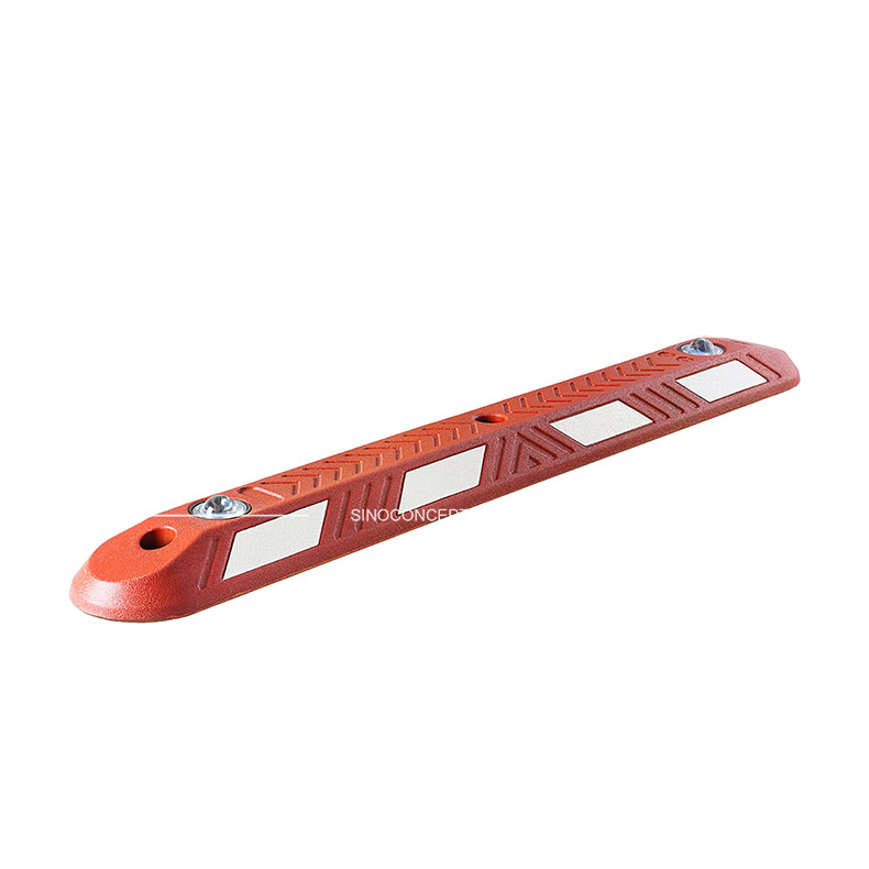 A red rubber lane divider with white reflective films and 360° solid glass road studs for enhancing visibility.