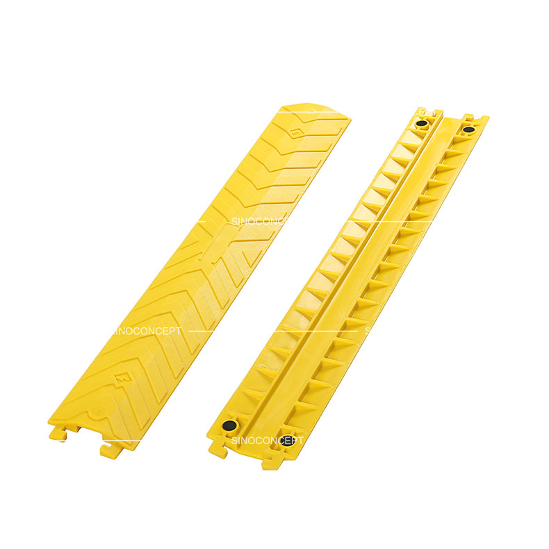 Small size yellow drop over cable protectors made of polyurethane designed with skidproof surface and four black anti-slip pads