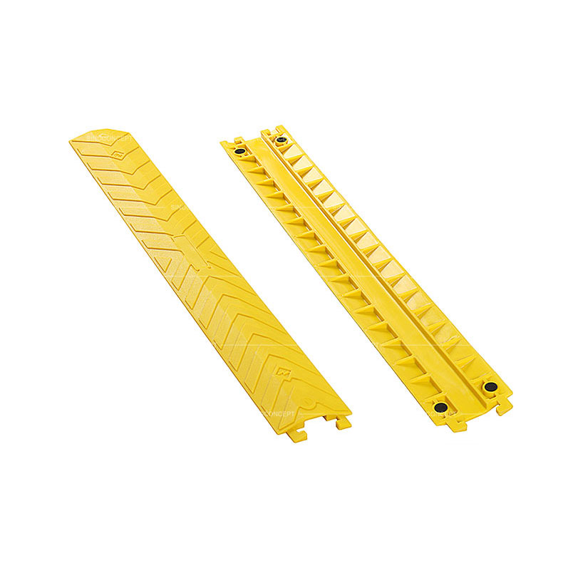 Small size yellow drop over cable protectors made of polyurethane designed with skidproof surface and four black anti-slip pads