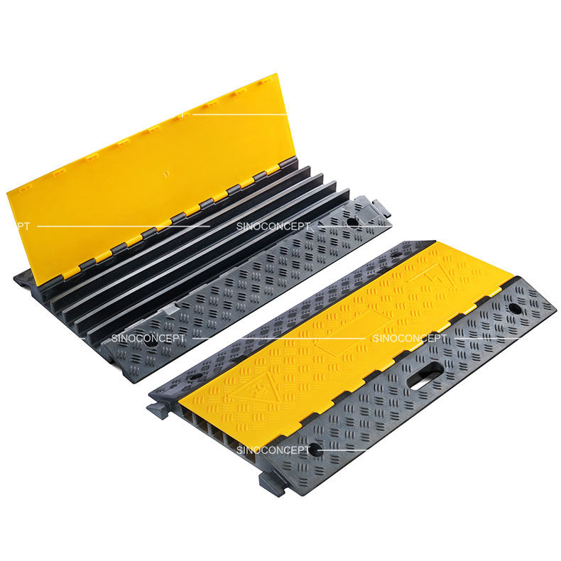 5 channels cable ramps made of rubber also called cable protectors designed with anti-slip surface and yellow plastic lids.