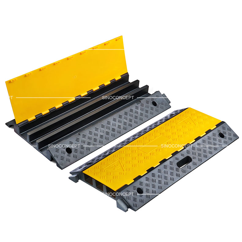 3 channels cable ramps made of rubber also called floor cable protectors designed with skidproof surface and yellow plastic lids.