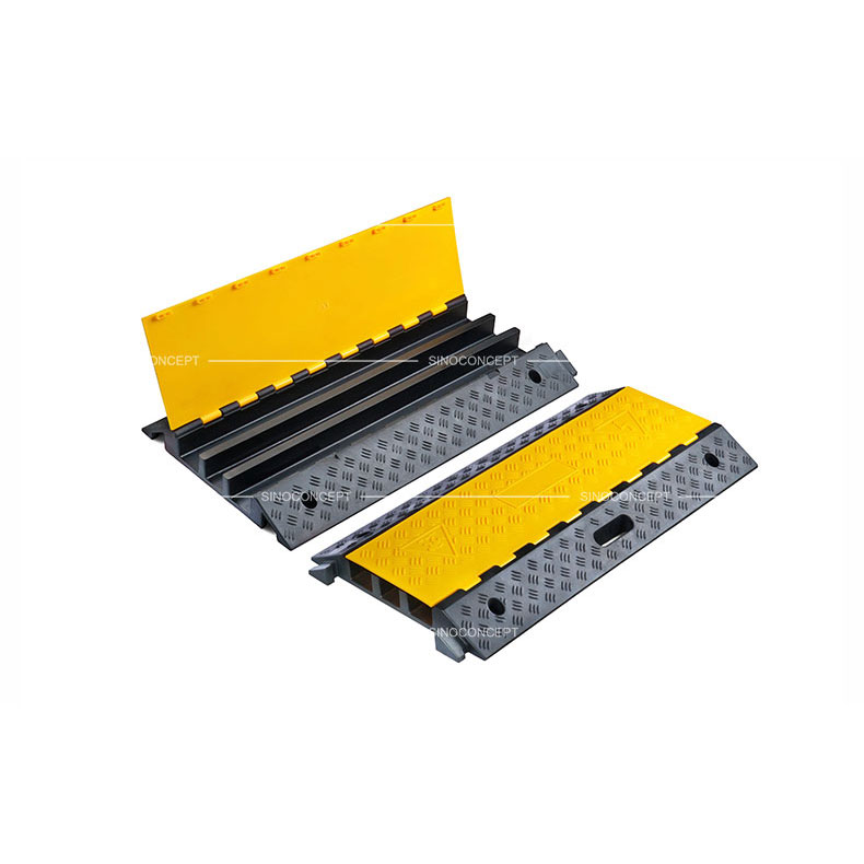 3 channels cable ramps made of rubber also called floor cable protectors designed with skidproof surface and yellow plastic lids.