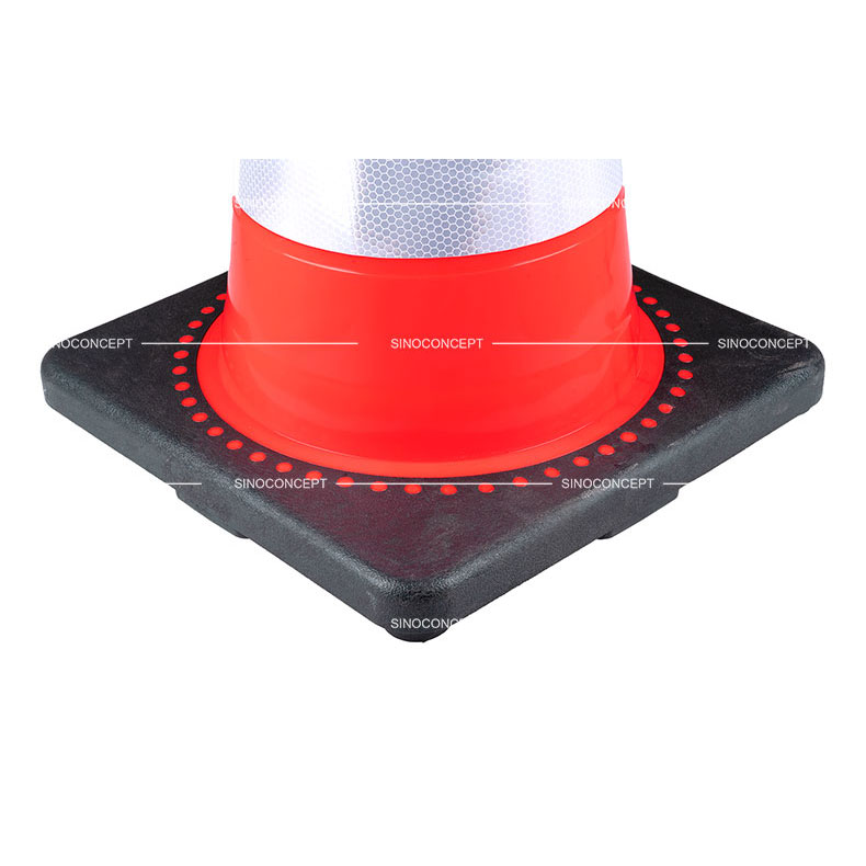 A 750mm weighted traffic cone made of PVC material and black rubber base, also pasted with glass bead reflective tapes for traffic management.