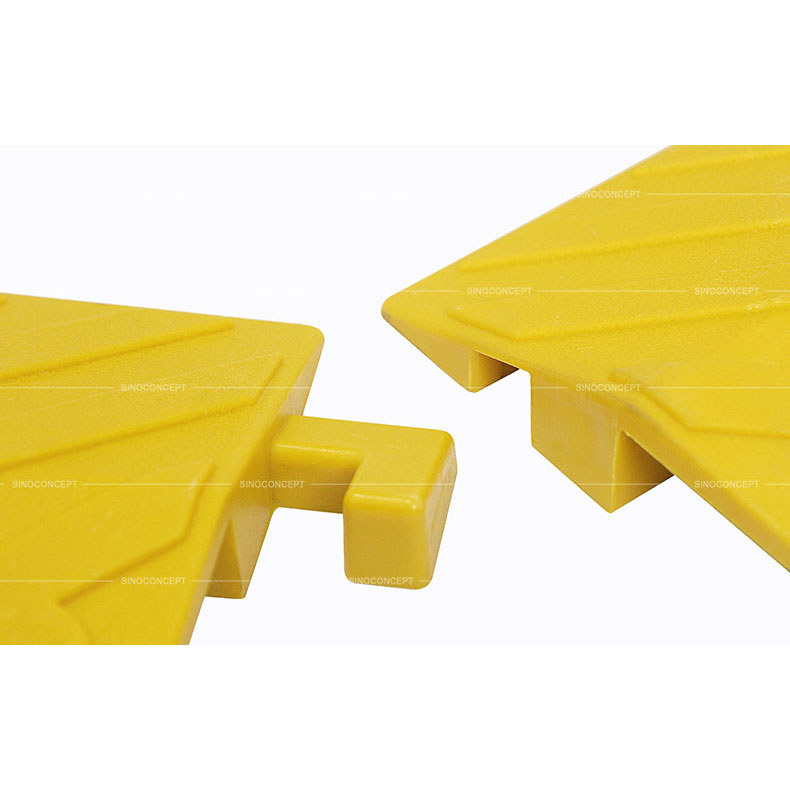 Small size yellow drop over cable ramps designed with a convenient and strong interlocking system to prevent disconnection