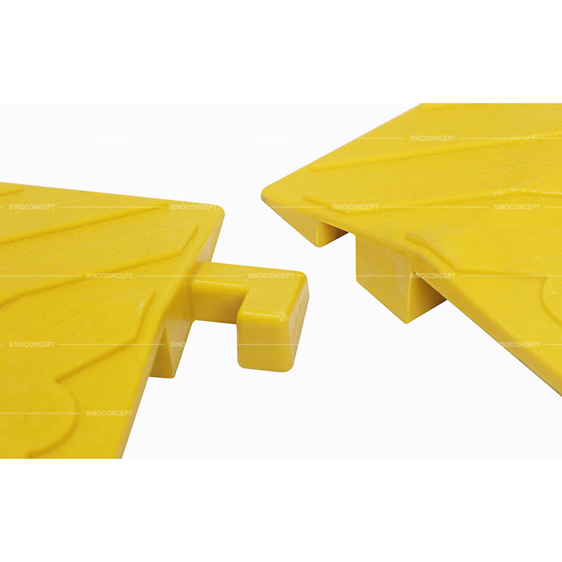 Big size yellow cable cover also called drop over cable ramp designed with an interlocking system to prevent disconnection