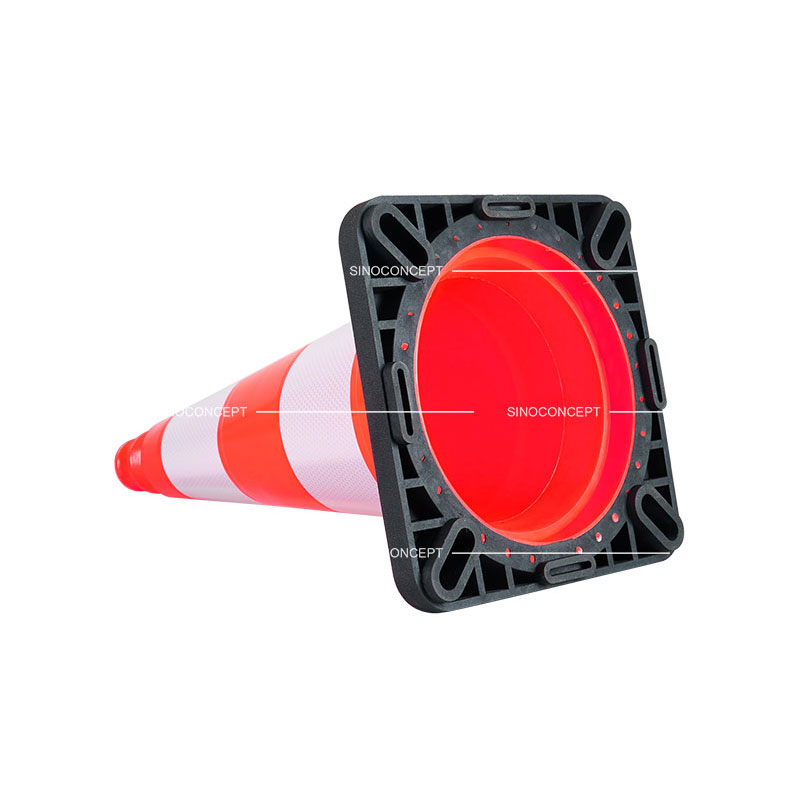 Bottom view of the black rubber base for orange PVC traffic cones also called road safety traffic cones.