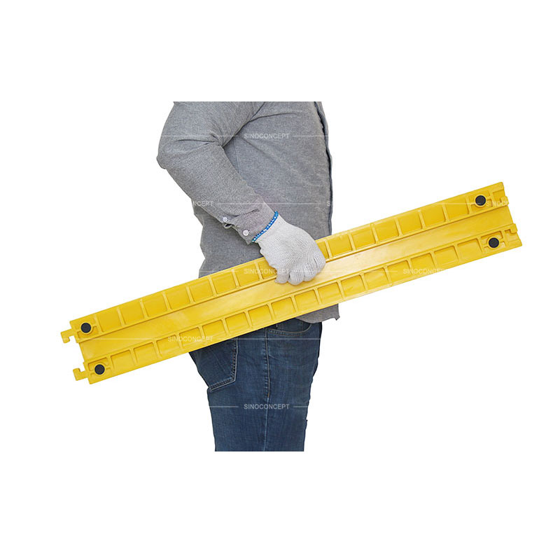 Polyurethane drop over cable ramp of yellow colour designed with convenient handles for easy movement and black anti-slip pads