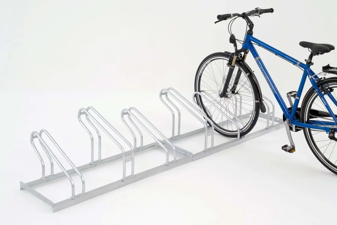Steel floor cycle racks used for indoor or outdoor bike parking.