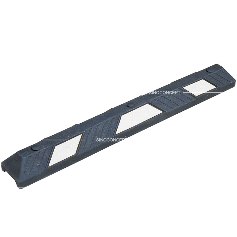 A 1220mm long parking block made of plastic-rubber composite with white reflective films.