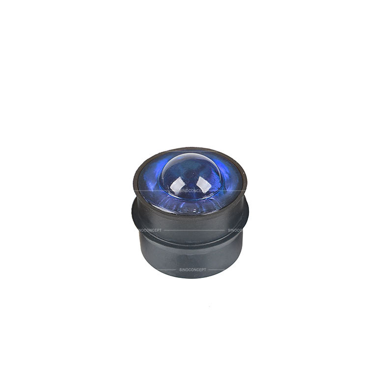Blue glass reflective road stud also called road safety stud made of glass and steel used on road for traffic management